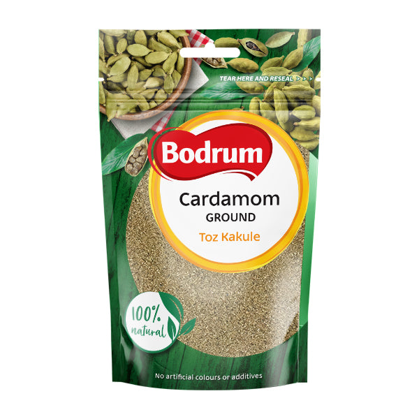 Packaging of Bodrum ground cardamom with green cardamom seeds on a white background