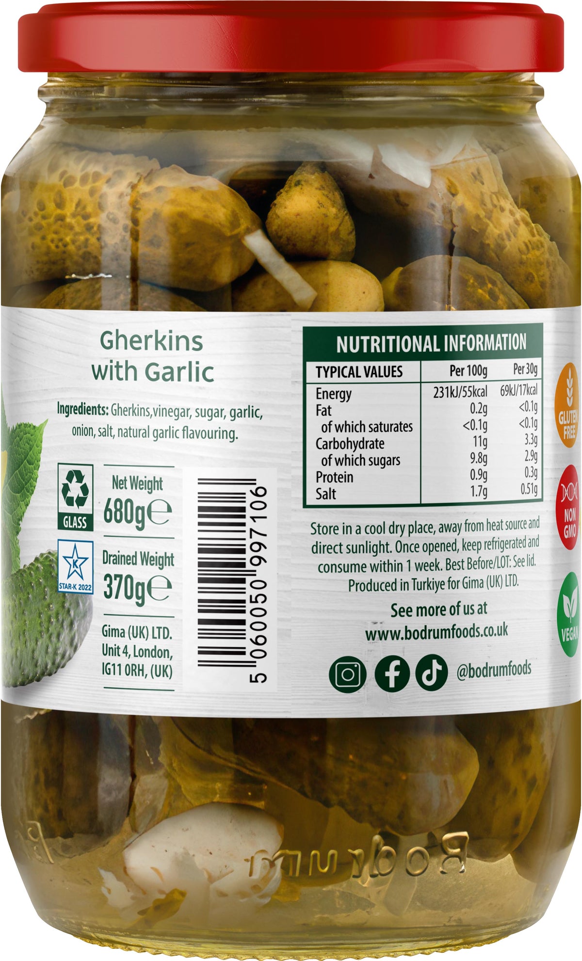 Jar of gherkins with garlic and nutritional information label on a white background