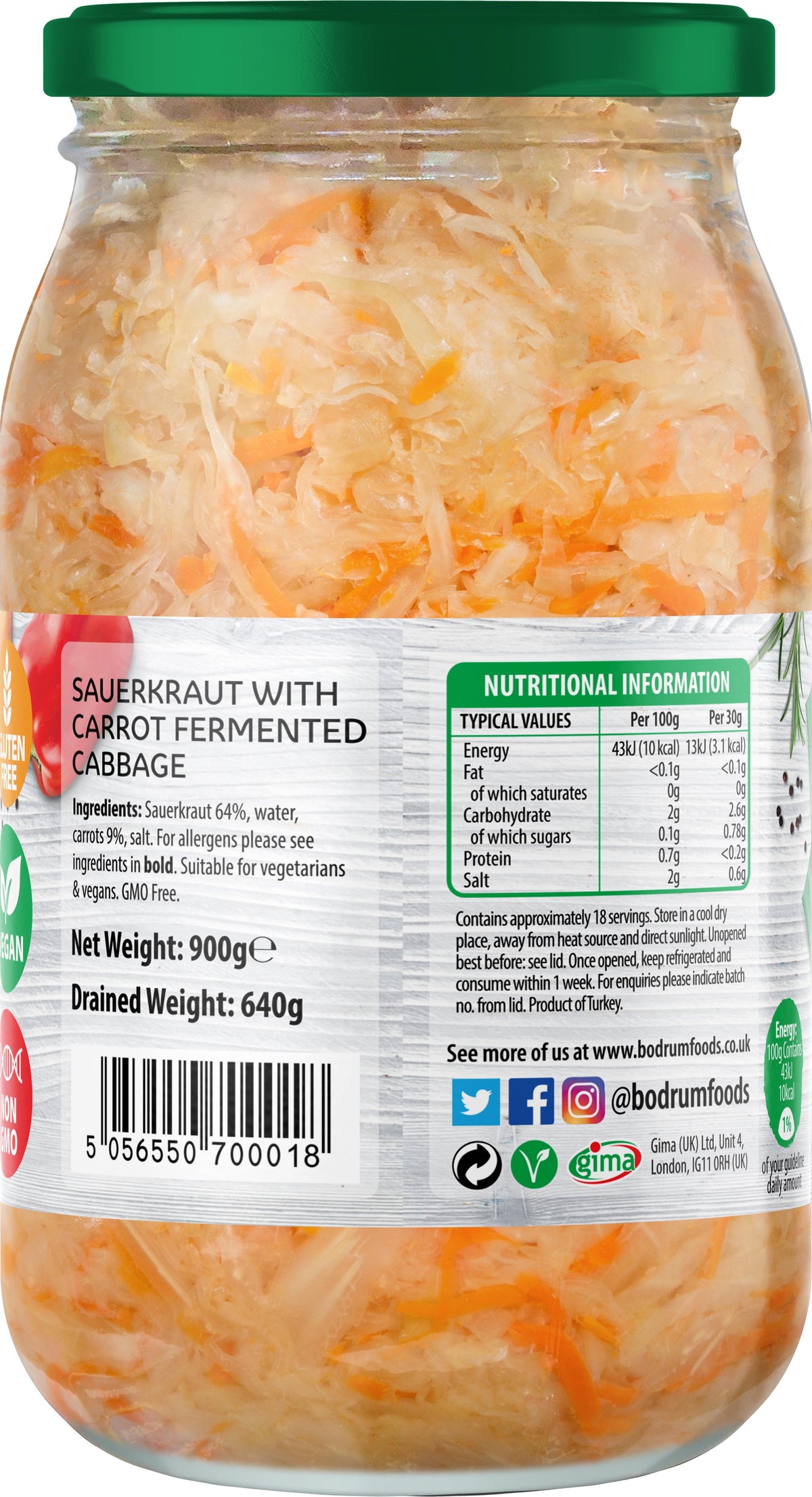 Jar of sauerkraut with carrot, label showing nutritional information.