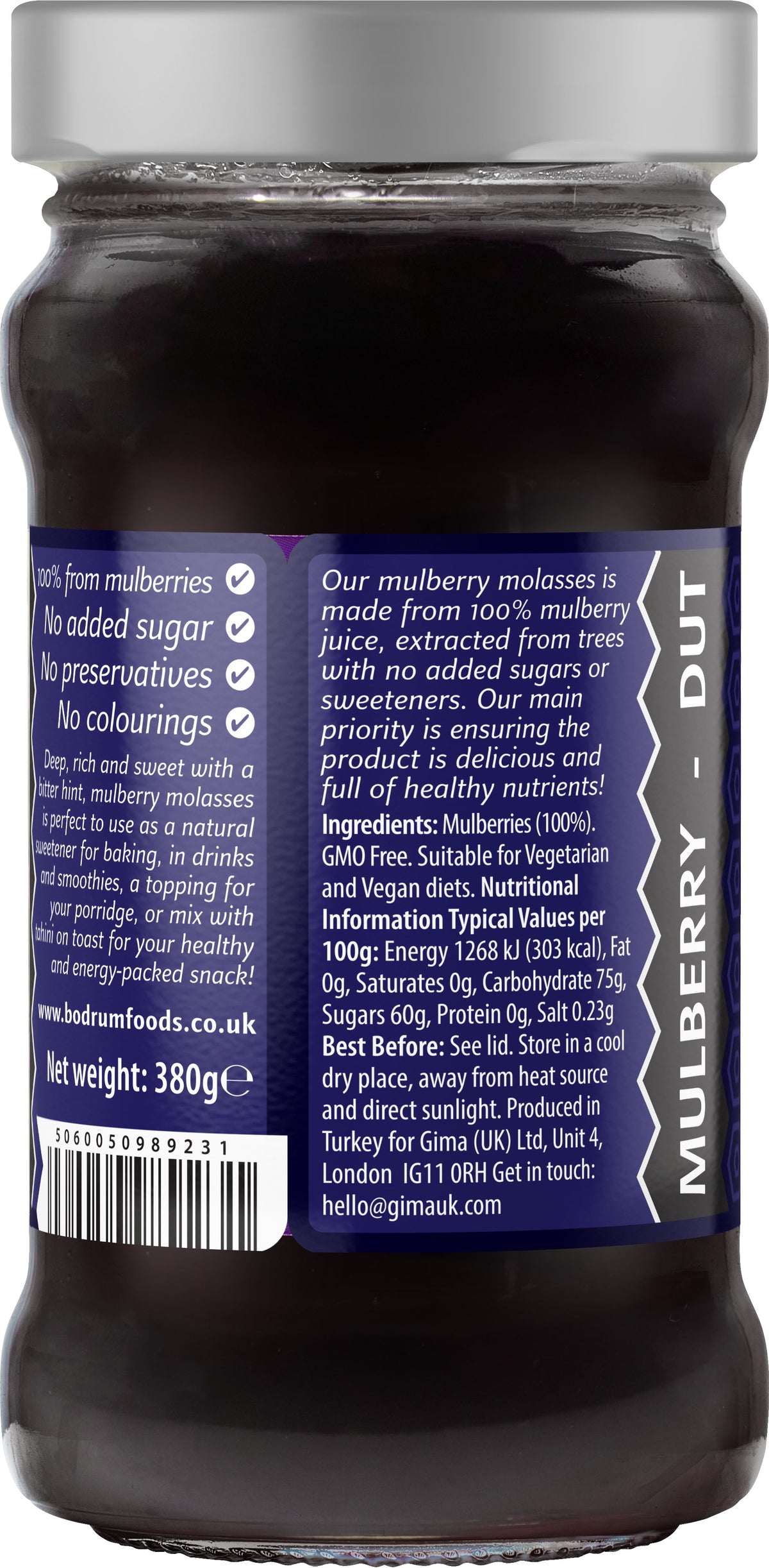 Jar of mulberry jam with a label on a white background