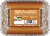 Container of halva with a label on a white background