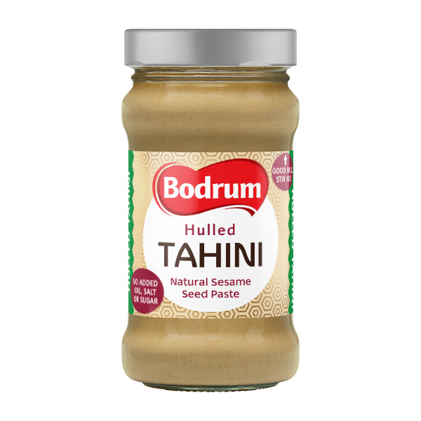 Jar of Bodrum hulled tahini on a white background