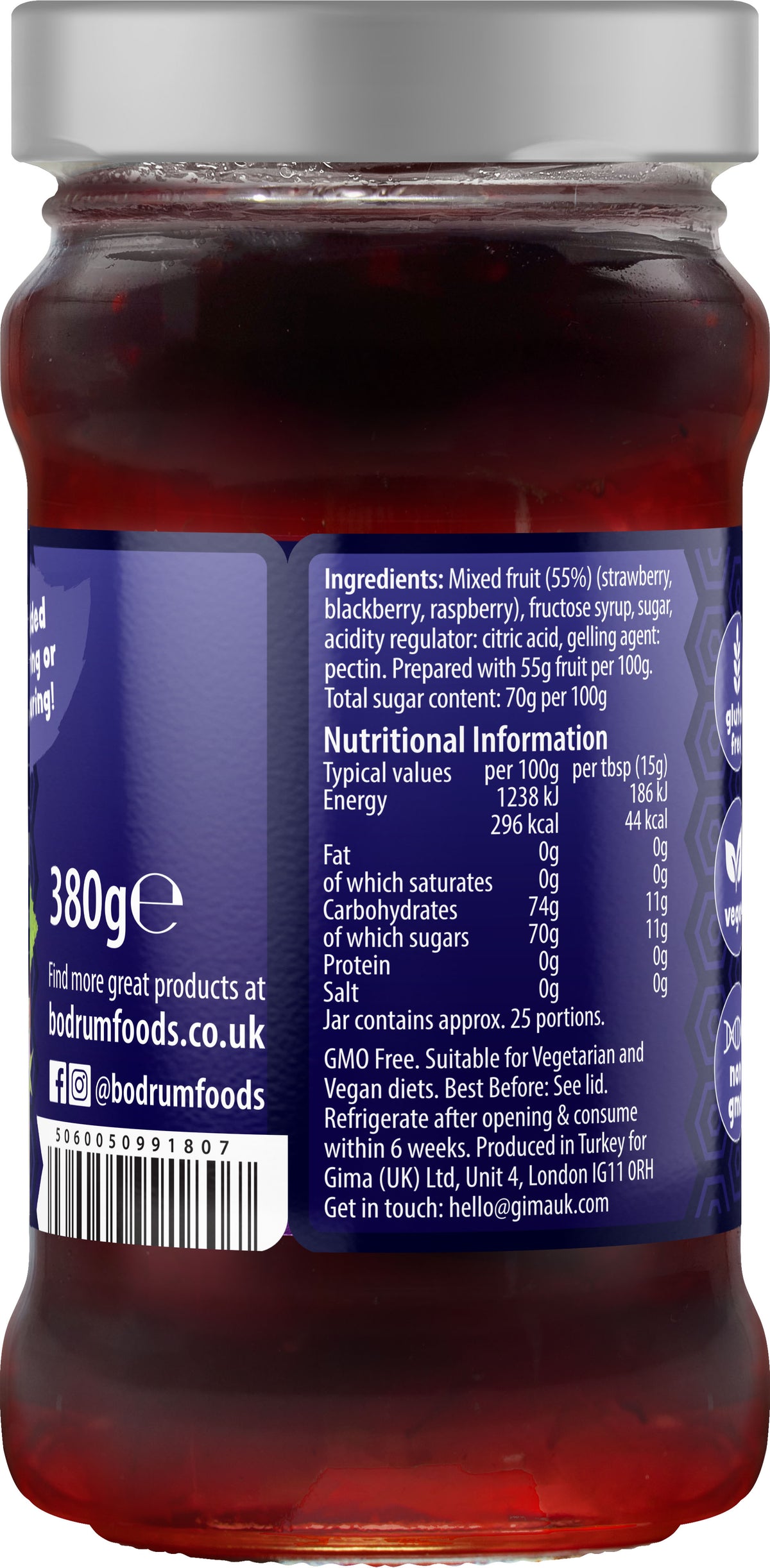 Jar of mixed fruit preserve with label showing ingredients and nutritional information.