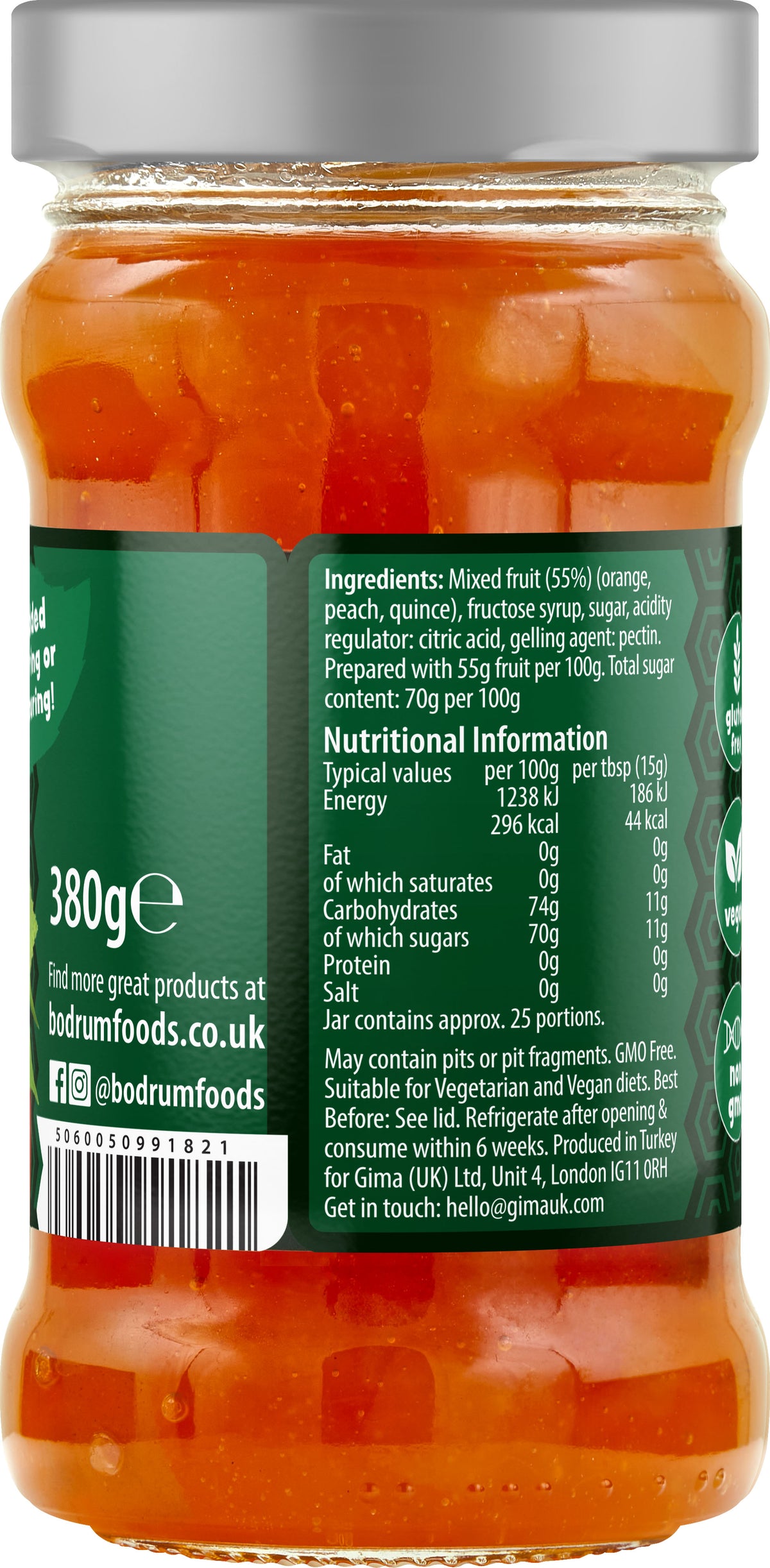 Jar of orange food with a green label showing ingredients and nutritional information.