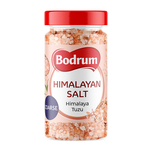 Bodrum Himalayan salt jar with red lid on a white background