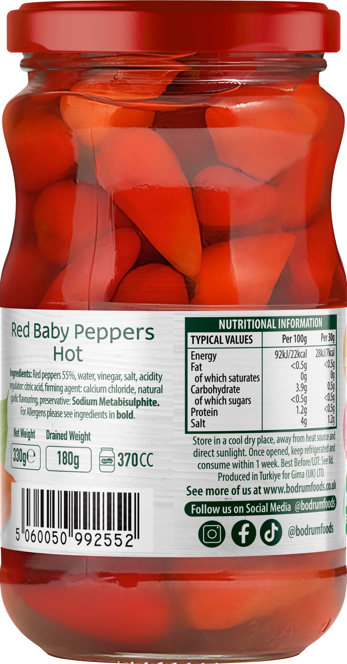 Jar of red baby peppers with nutritional information label