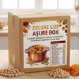 Deluxe size Assure Box on a table with ingredients around, kitchen in the background